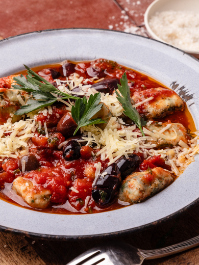 Ricotta and Spinach Gnocchi with Tomato and Olive Sauce