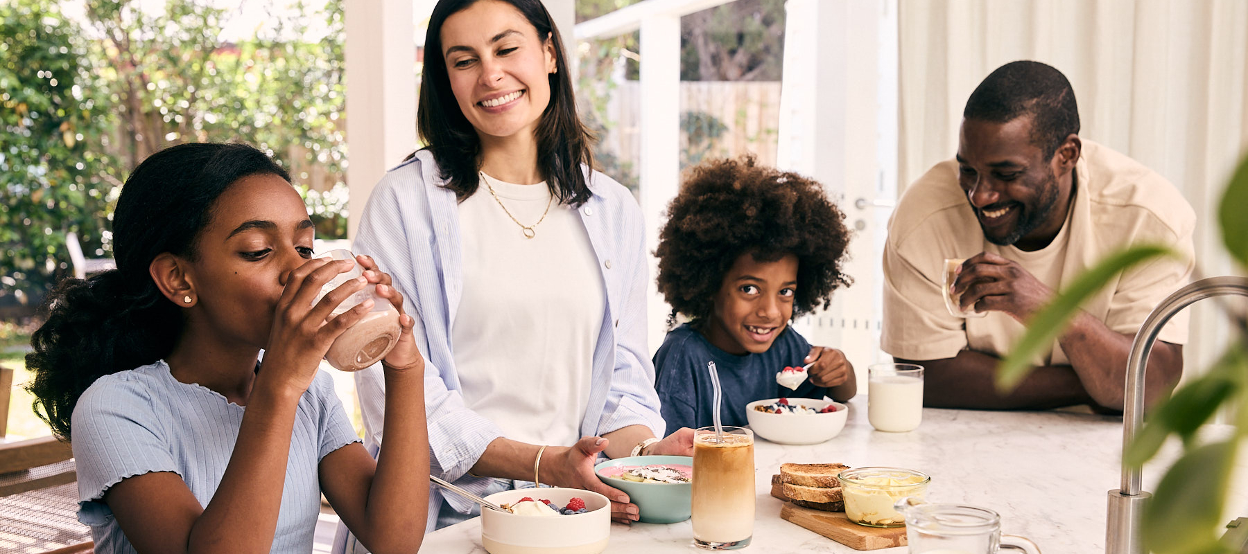 Young family eating breakfast