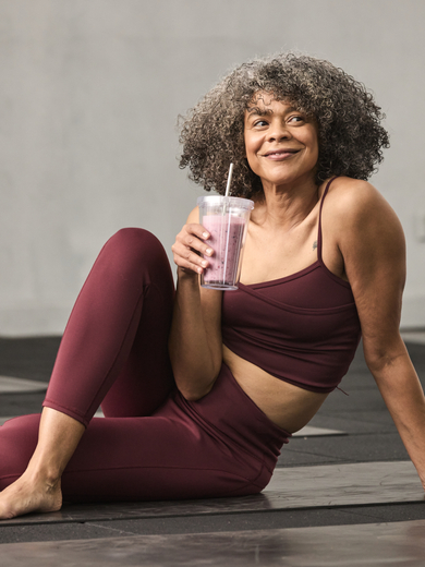 Yoga woman with smoothie