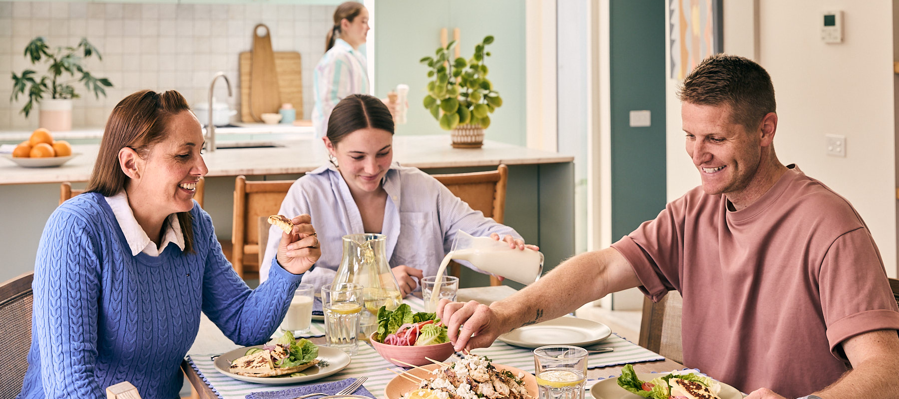Family at the table with food