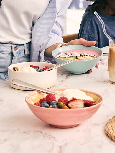 Young family eating breakfast