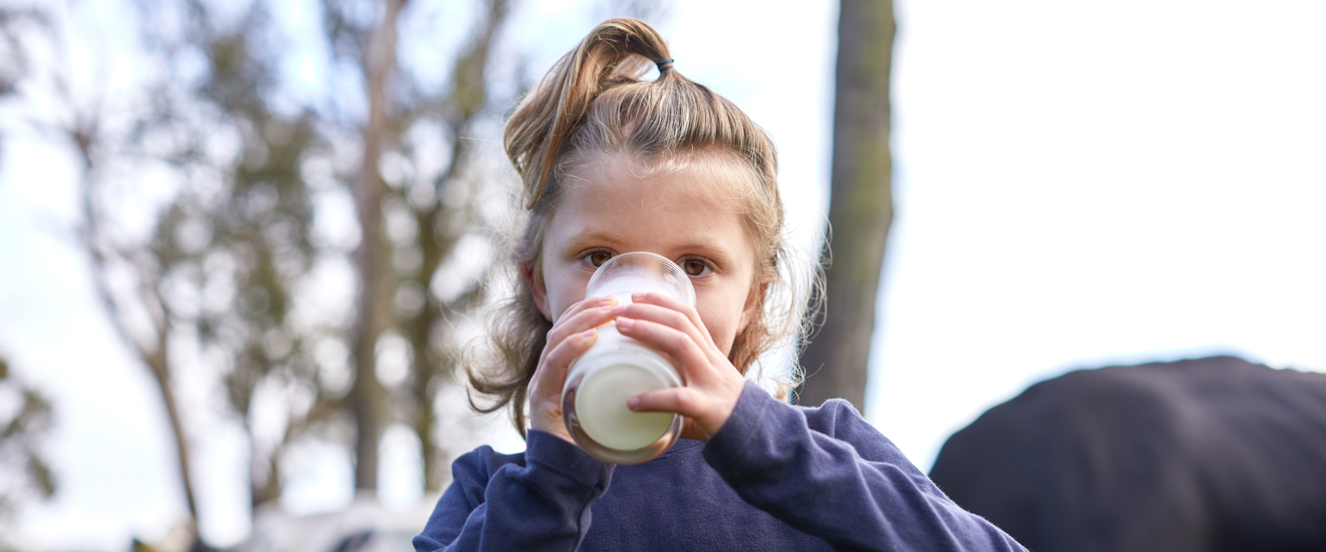 Farm children with milk