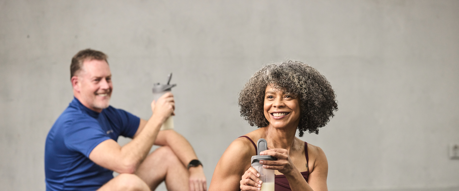 Man and woman on yoga mats
