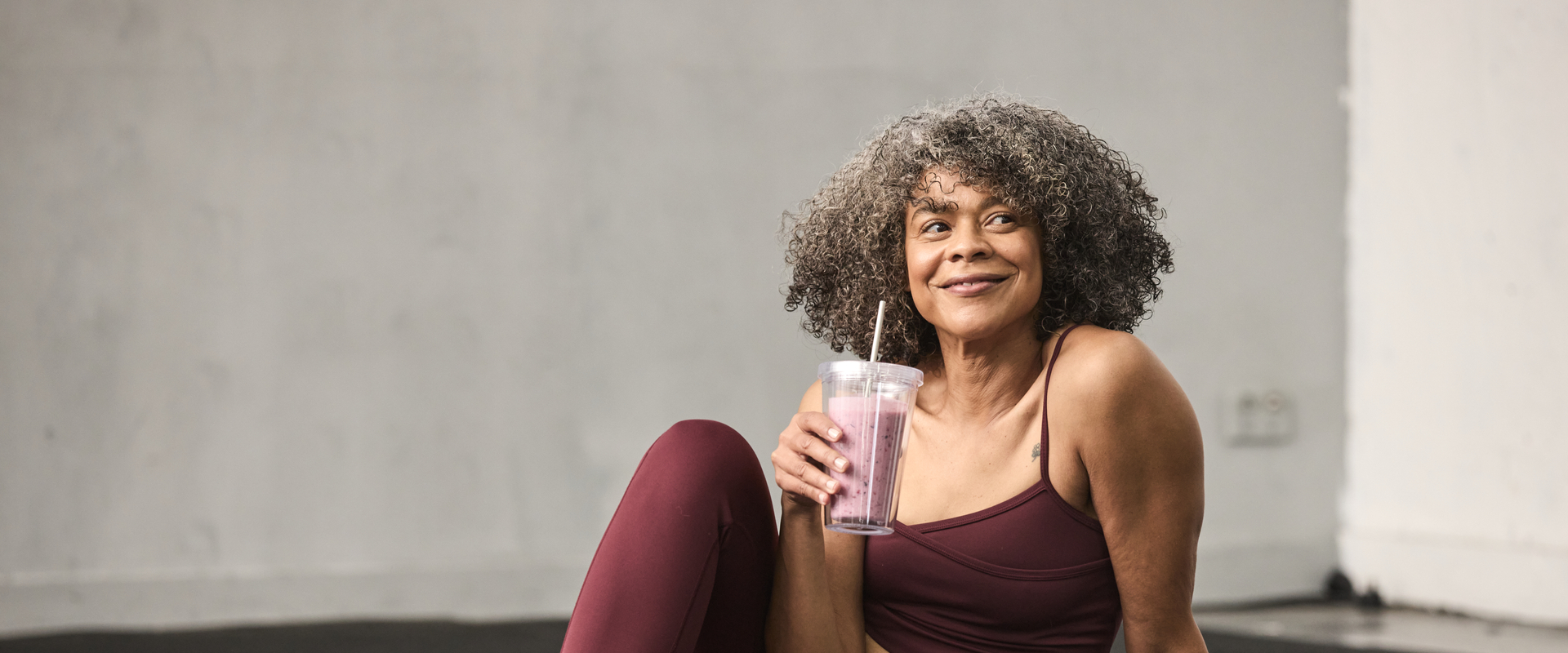 Yoga woman with smoothie