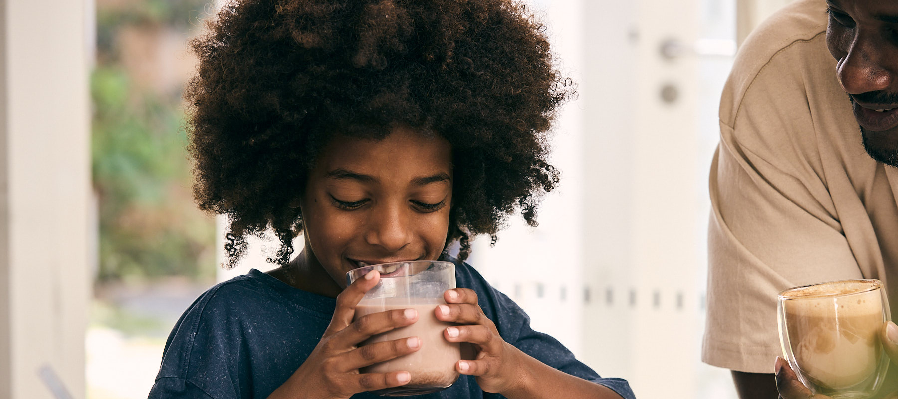 Boy drinking chocolate milk