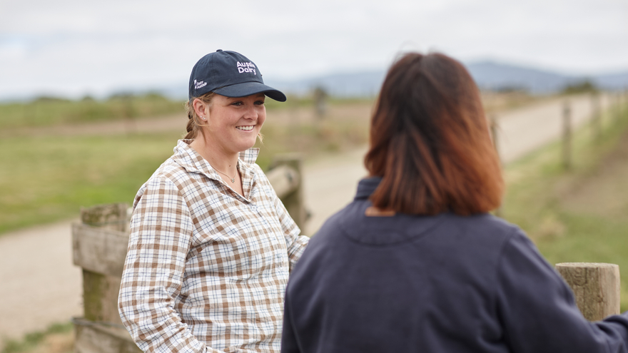 Farmer talking with DA staff on farm 
