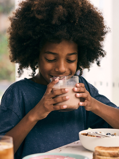 Boy drinking chocolate milk