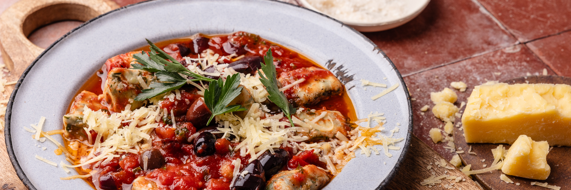 Ricotta and Spinach Gnocchi with Tomato and Olive Sauce