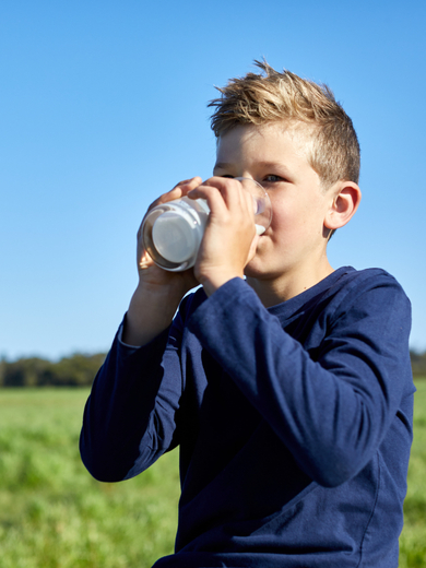 Child with glass of milk